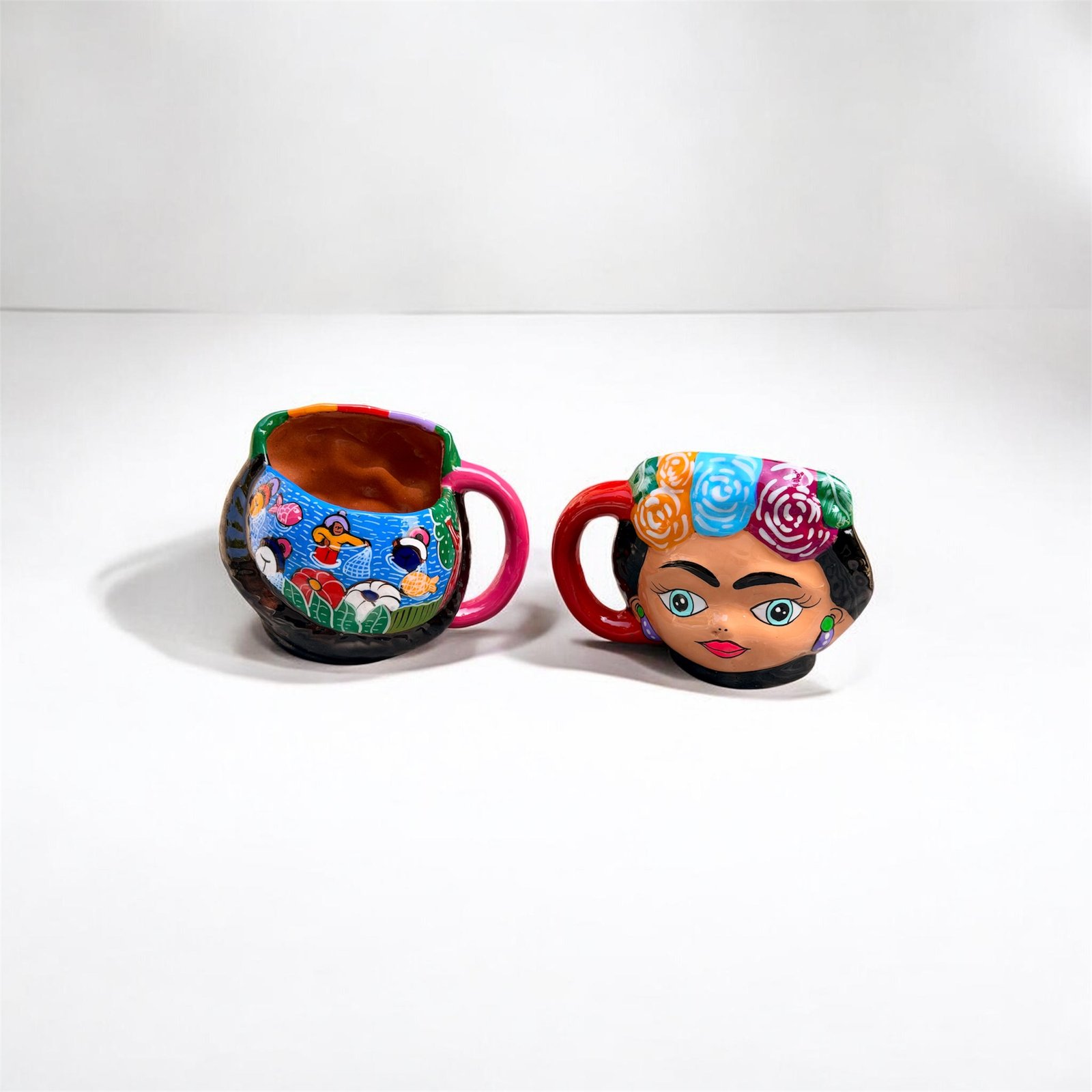one of a kind Frida style clay mugs