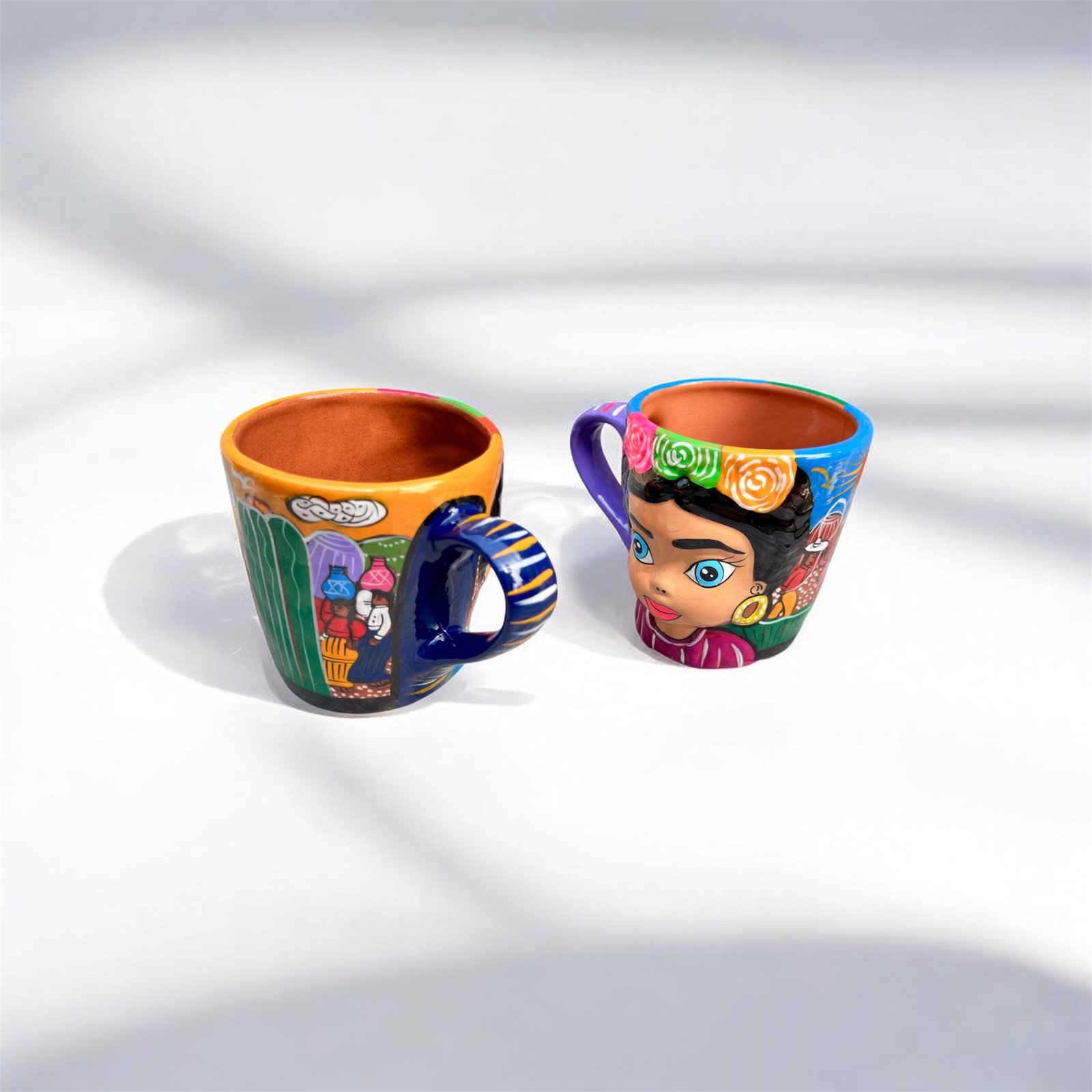 one of a kind Frida style clay mugs