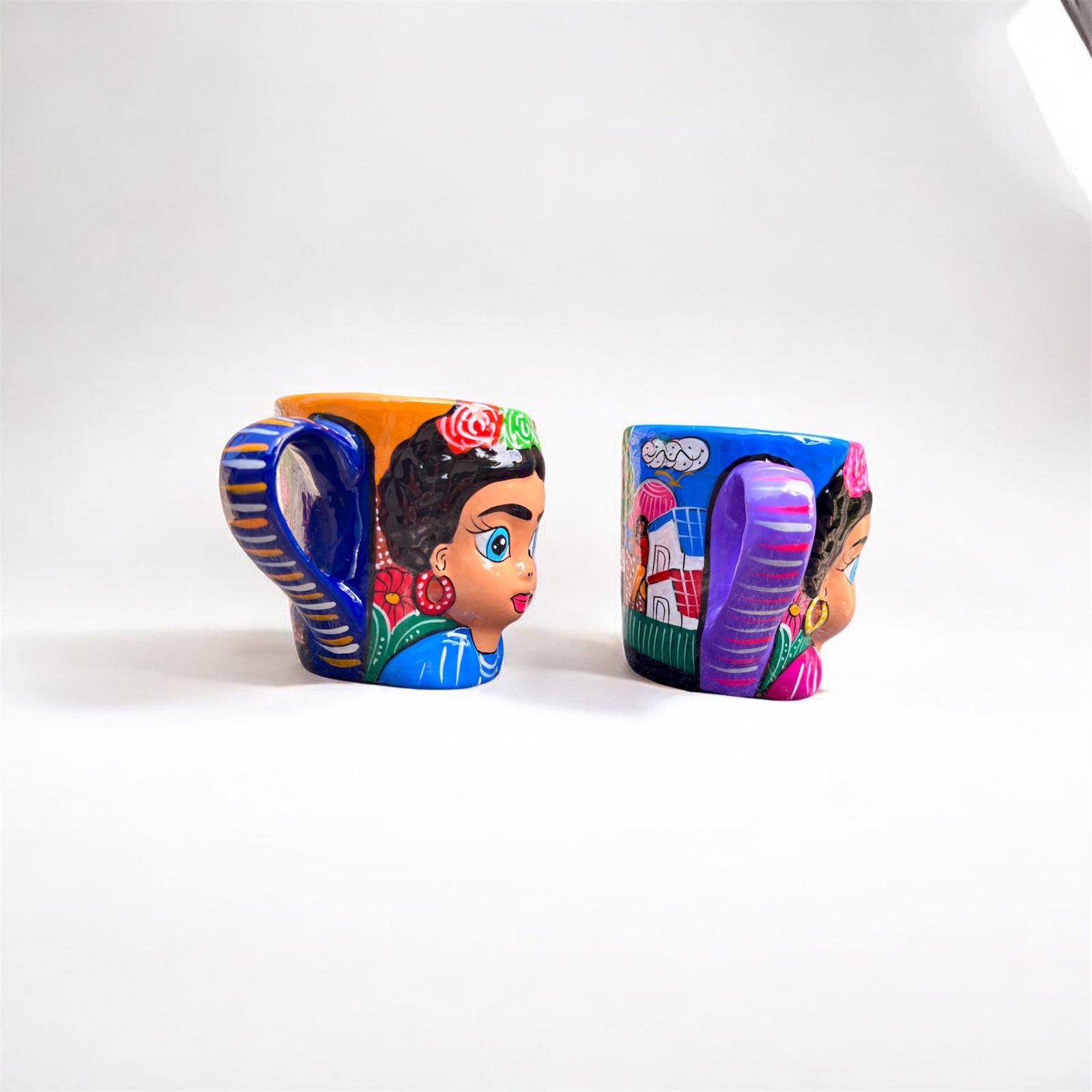 one of a kind Frida style clay mugs