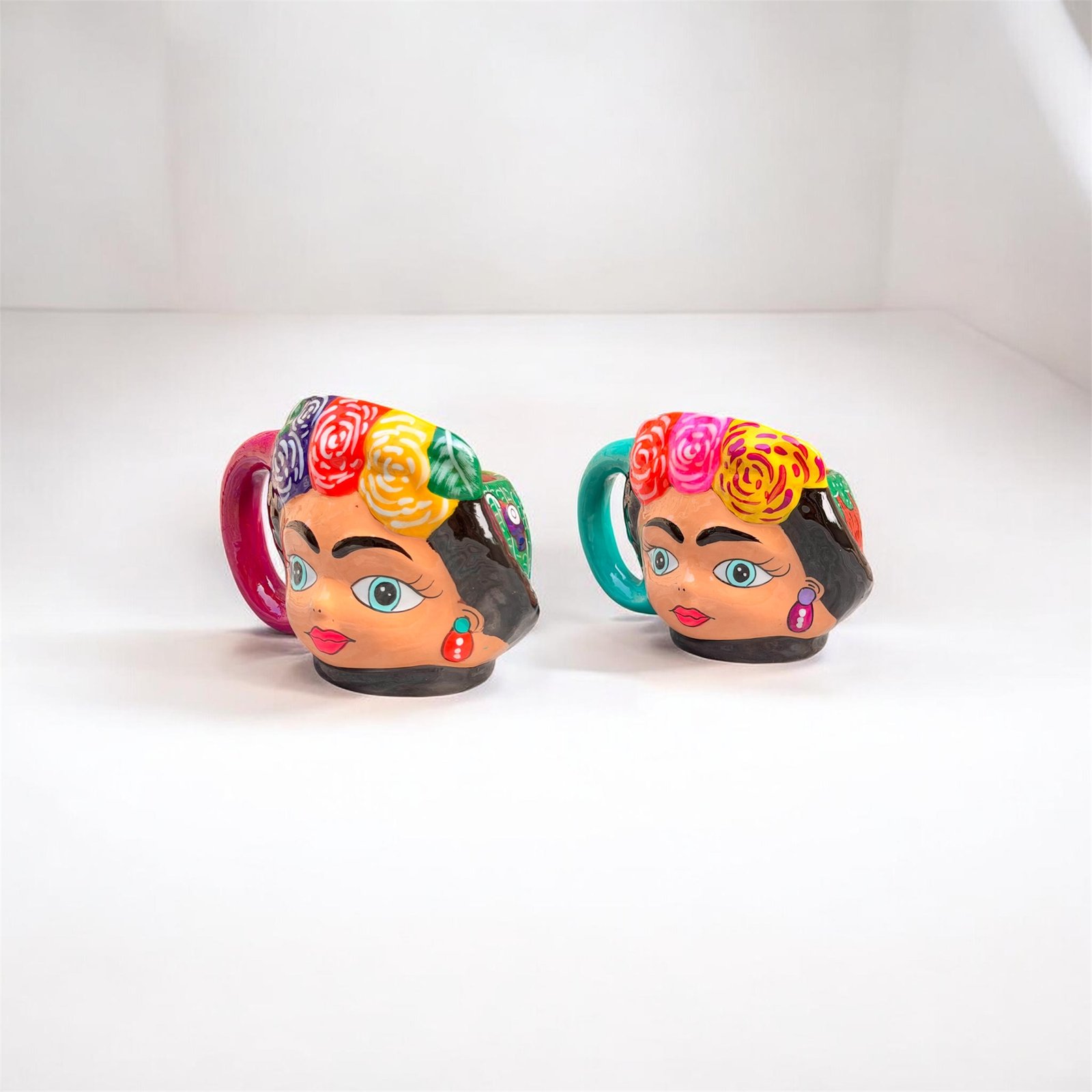 one of a kind Frida style clay mugs
