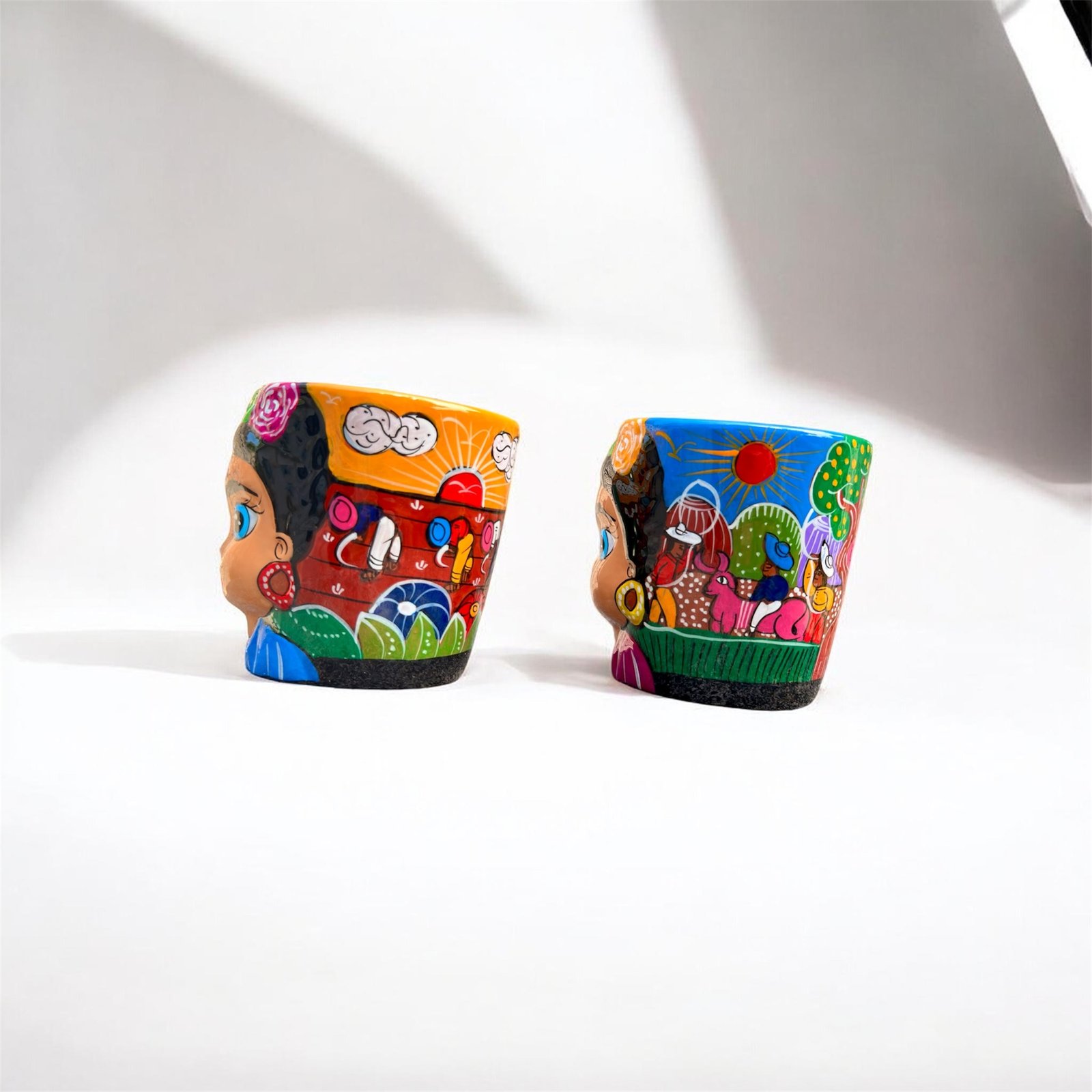 one of a kind Frida style clay mugs