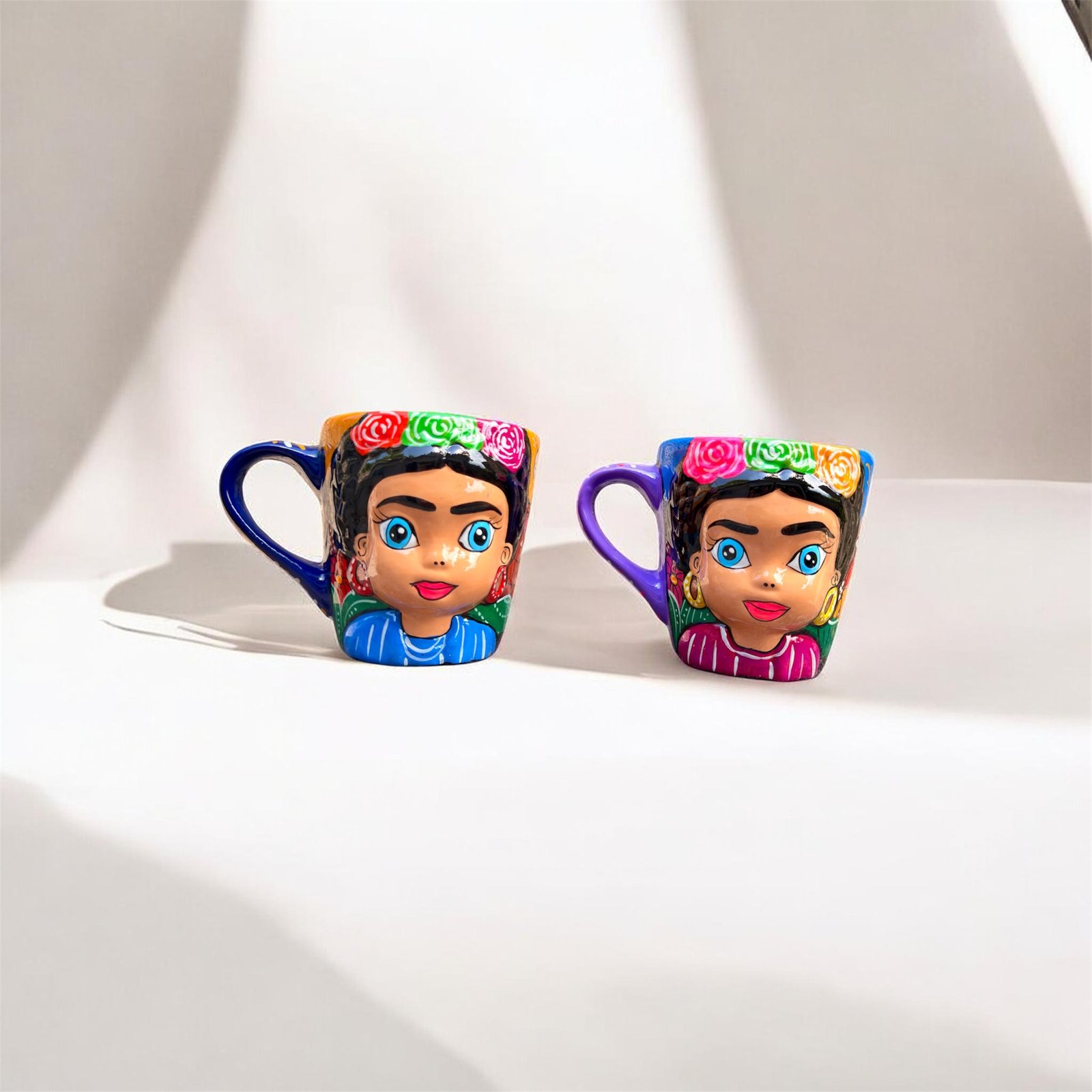one of a kind Frida style clay mugs